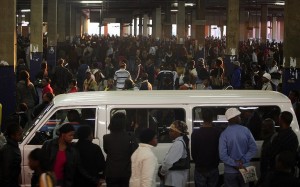 People stand in line at the Bree taxi rank in Johannesburg on June 7, 2010. Johannesburg. Photo: AFP/Paballo Thekso