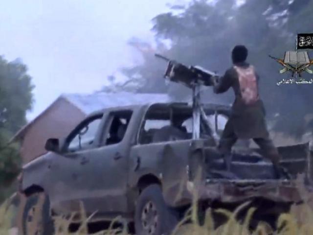 Boko Haram soldier with machine gun 
