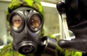 A scientist dressed in special biohazard clothing. Photo: AFP/Thomas White
