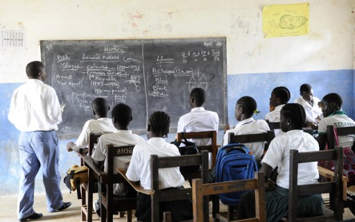 Pupils attend a class in a school in Monrovia on April 15, 2016. Photo: AFP/Zoom Dosso