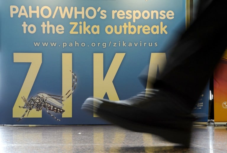 A banner on zika virus outbreak at the opening of the World Health Assembly in Geneva in May 2016. Photo: AFP/FABRICE COFFRINI