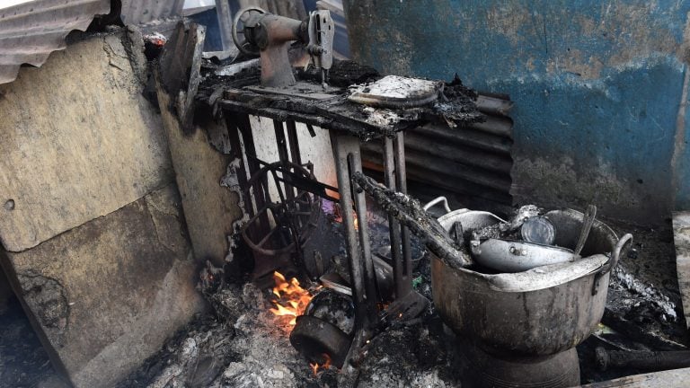 Fire burns property at the police barracks in Lagos' Obalende district in September 2016. Several families were rendered homeless. Photo: Pius Utomi Ekpei / AFP