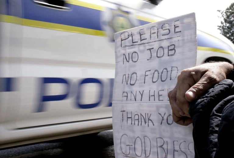A South African beggar on a street in Johannesburg in 2005. Photo: AFP/Fati Moalusi