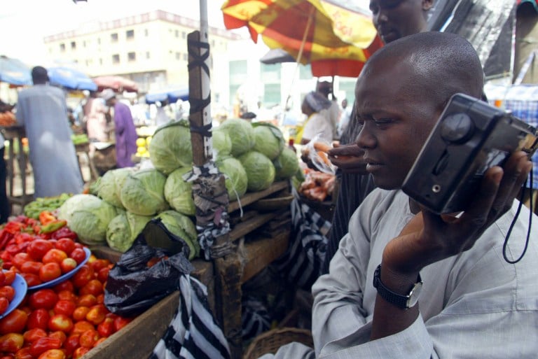 A file photograph of a stall owner in a market in Kano, Nigeria. Photo:AFP/Pius Utomi Ekpei 