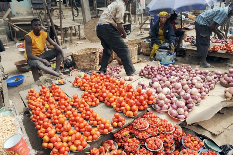 Vendors display their vegetables at Mile 12 market in Lagos. Photo: AFP/Pius Utomi Ekpei