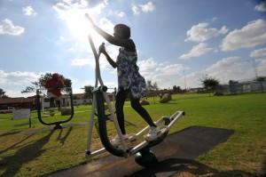 A woman works out at new outdoor gym in Soweto in March 2012. Photo: AFP/ALEXANDER JOE