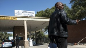 Security personnel stand outside Weskoppies Psychiatric Hospital on May 20, 2014 in Pretoria. Photo: AFP/Mujahid Safodien