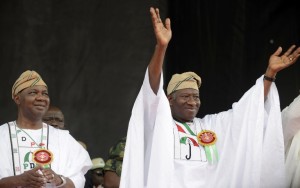 Nigeria's President Goodluck Jonathan (right) waves to supporters during a falling in Lagos last month. Alongside him is the country's vice-president Namadi Sambo. Photo: AFP/Pius Utomi Ekpei