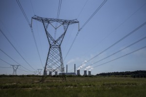 Power lines leaving the Eskom Duvha Power Station, some 15km east of Witbank, in the coal rich Witbank region of South Africa. Photo: Marco Longari/AFP
