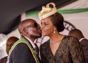 This file photo, taken in April 2017, shows President Robert Mugabe kissing his wife Grace Mugabe during the country's 37th Independence Day celebrations at the National Sports Stadium in Harare. Photo: AFP/Jekesai NJIKIZANA
