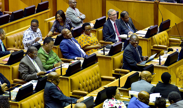 President Cyril Ramaphosa enjoys a lighter moment during the debate of his State of the Nation address on 19 February in Cape Town. Photo: GCIS