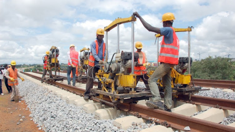 Workers at a building site of the Abuja light rail project in September 2012 in Abuja. Nigeria is looking to strengthen its infrastructure. Photo: AFP/STRINGER