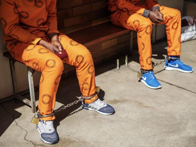 Prisoners with cuffs