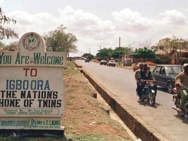 A signpost welcomes visitors to the southwestern Nigerian town of Igbo-Ora in March 2001. Photo: AFP/PIUS UTOMI EKPEI