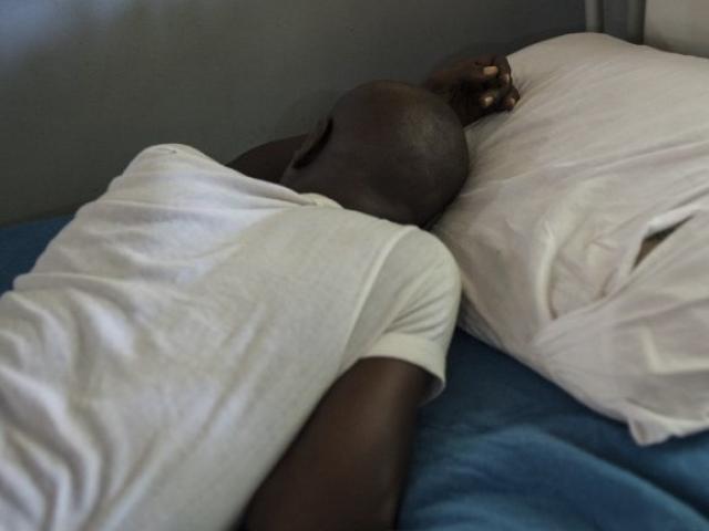A patient sleeps in a ward of the Federal Neuro-Psychiatric Hospital in Maiduguri in northeastern Nigeria in September 2016. The hospital has seen a surge in patients since the beginning of the Boko Haram insurgency in 2009. Photo: AFP/STEFAN HEUNIS