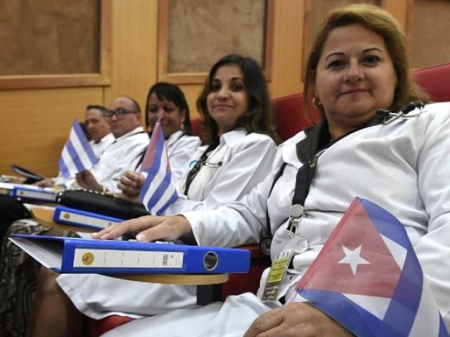 Cuban doctors follow an induction programme at the Kenya School of Government in June 2018 in Nairobi. Photo: AFP/SIMON MAINA