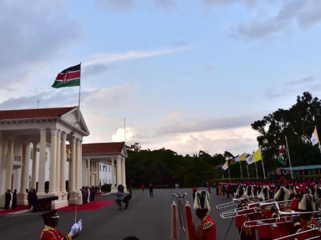 Kenya's state house, a symbol of executive power, is seen in November 2015 during a welcome ceremony when the Pope visited Nairobi. Kenyans are debating how to cut public spending and grow the economy. Photo: AFP/GIUSEPPE CASACE