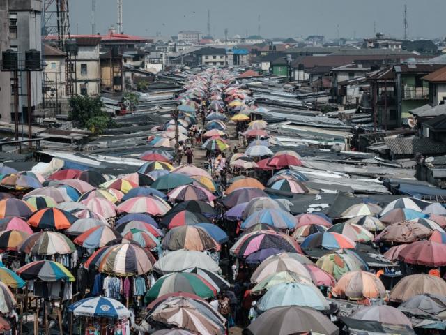 City market with lots of umbrellas 