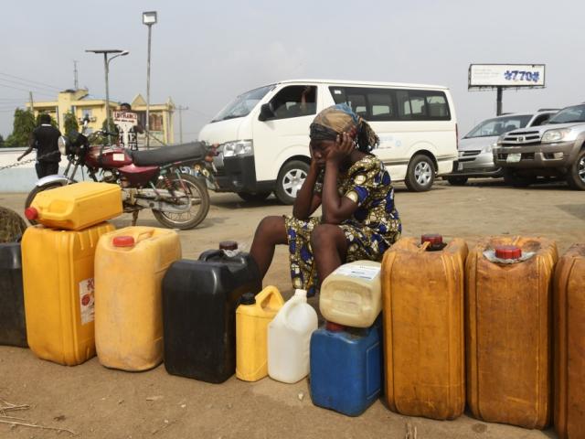Nigerians wait for petrol products during a past shortage in the country.