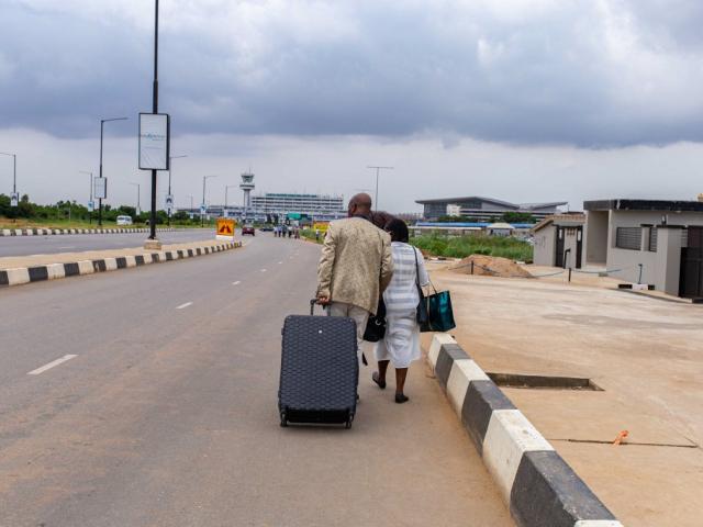 Passengers trek to the airport terminal in Ikeja, Lagos in October 2020