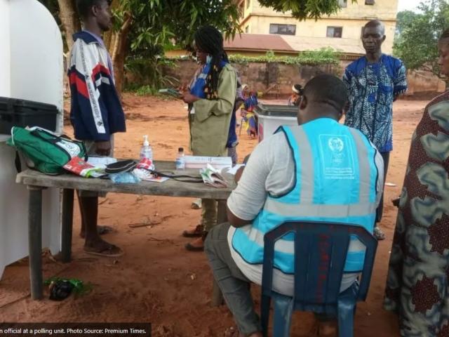 Image of INEC election official at a polling unit. 