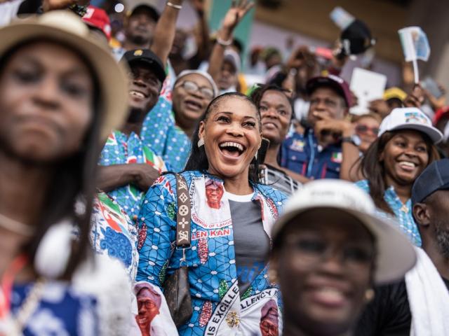 Supporters of the governing All Progressives Congress (APC) react at the Teslim Balogun Stadium during their final campaign rally in Lagos on 21 February 2023