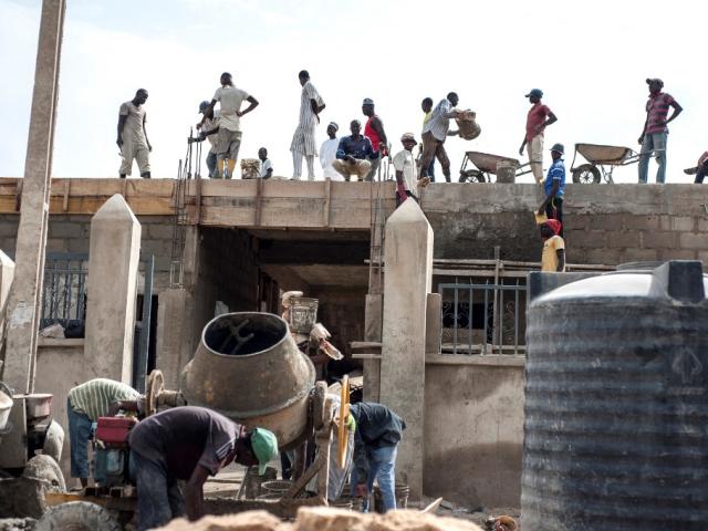 Construction employees work in Maiduguri in north-eastern Nigeria in this July 2017 photo.